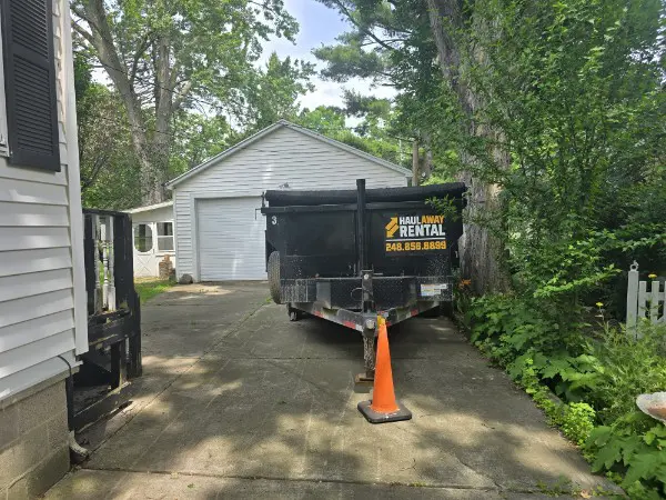 dumpster rental Oakland County MI driveway safe trailer