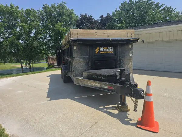 dumpster rental in Bruce Township MI driveway safe trailer on residential driveway