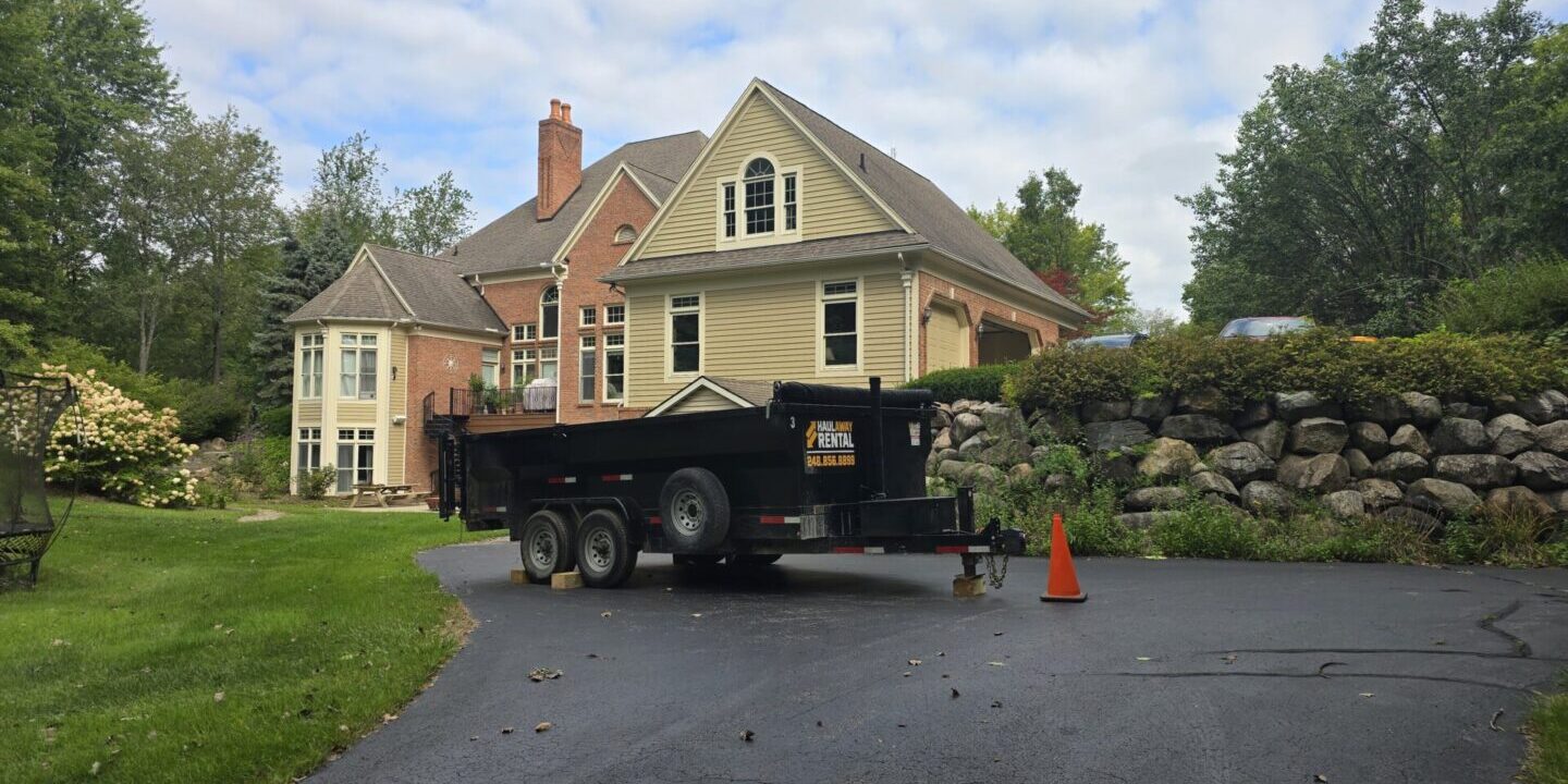 Dumpster rental in Oakland Township MI driveway-safe 20-yard dumpster